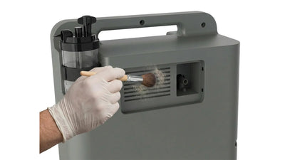 Kingon P2-O5E getting its filter cleaned with a brush. Shop now at Kingon.