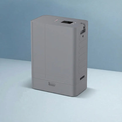 Kingon P2-TOC transportable oxygen concentrator on a blue background. 