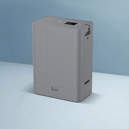 Kingon P2-TOC transportable oxygen concentrator on a blue background. 