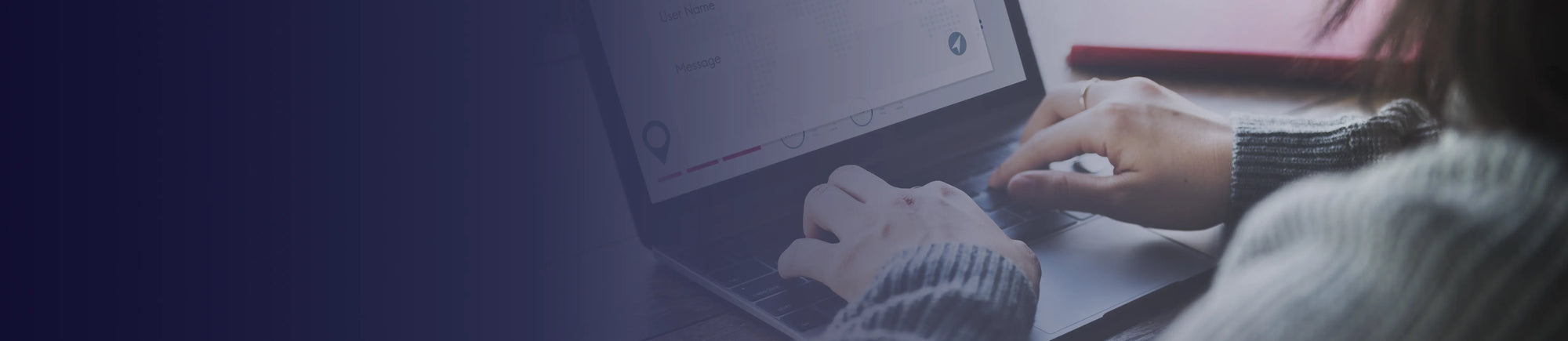 Woman typing on a laptop with a blue gradient overlay on top.